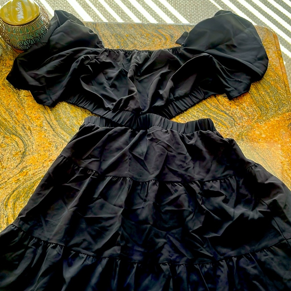 NWT BTFBM . One piece open sides  black ruffle  dress in medium.